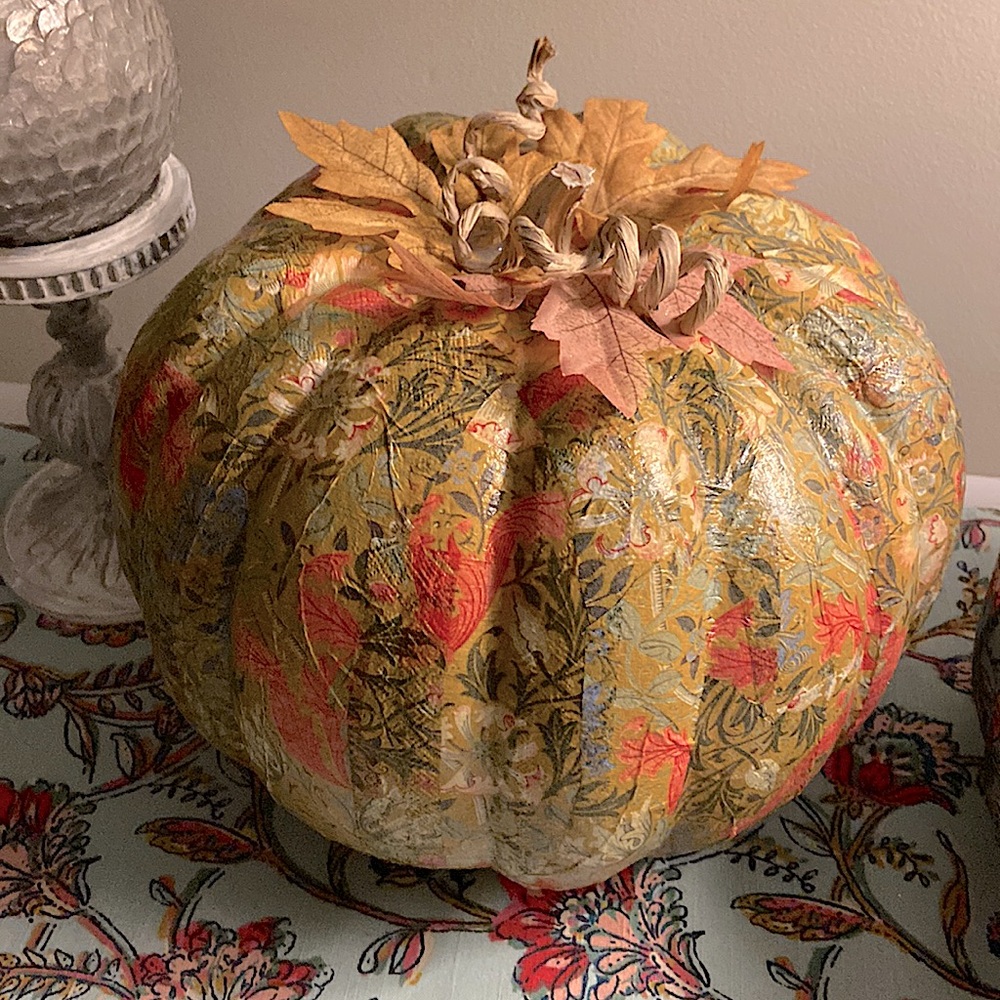 decoupaged fall pumpkin gold field w/blue, dk pk floral.  has a chinoiserie feel